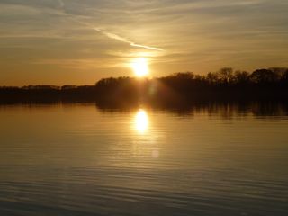 Foto See mit Sonnenuntergang